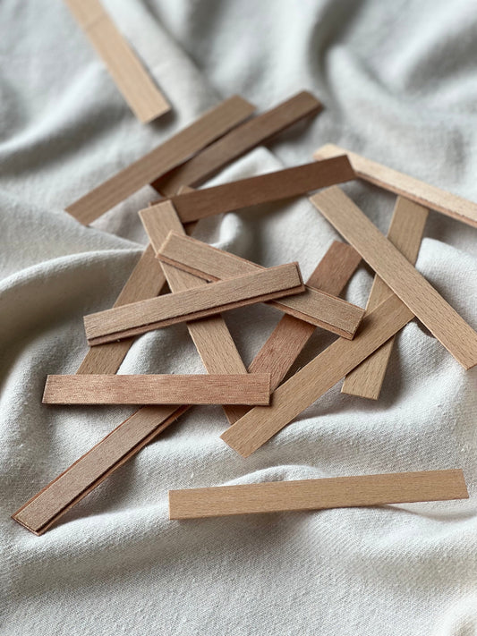 Mèche en bois ou mèche en coton : pourquoi ça change tout pour votre bougie